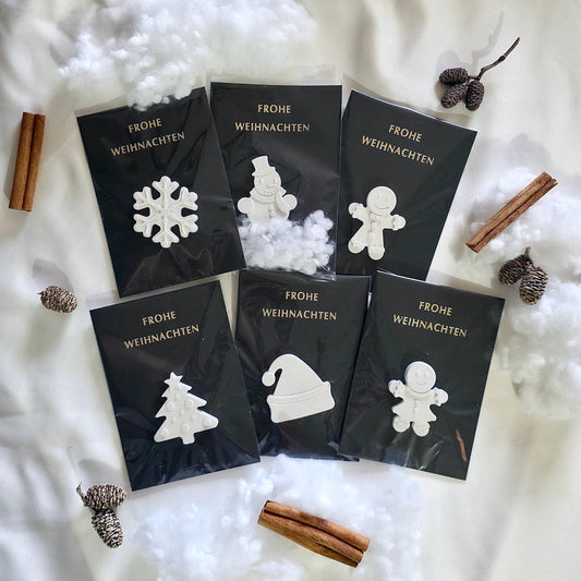 Auswahl verschiedener Figuren (Schneemann, Baum, Lebkuchen, Nikolausmütze)